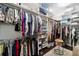 Large walk-in closet with custom organization system featuring shelving and hanging space at 4103 Se 10Th Ave, Ocala, FL 34480