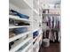 Organized walk-in closet with ample shelving for storing clothing, shoes and accessories at 4103 Se 10Th Ave, Ocala, FL 34480