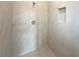 Detail of tiled shower, with built-in niche and rainfall shower head at 4524 Sw 110Th St, Ocala, FL 34476