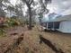 Backyard with a chain-link fence and greenery at 4580 Sw 110Th Ln, Ocala, FL 34476