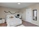 Bright bedroom featuring white furniture, carpeted floors, and decor at 5417 Sw 49Th Ave, Ocala, FL 34474