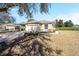 Beautiful one-story home with a two-car garage, well-maintained lawn, and inviting curb appeal at 6780 Sw 91St Cir, Ocala, FL 34481