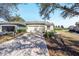 Beautiful single-story home featuring a two-car garage, well-maintained lawn, and inviting curb appeal at 6780 Sw 91St Cir, Ocala, FL 34481