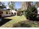 Spacious backyard with patio and lush lawn at 7972 Midway Drive Ter # O103, Ocala, FL 34472