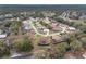 Beautiful aerial shot of a residential neighborhood with tree-lined streets and manicured lawns at 8223 Sw 113Th Ln, Ocala, FL 34481