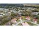 A panoramic aerial view of a residential community featuring well-maintained homes and lush landscaping at 8223 Sw 113Th Ln, Ocala, FL 34481