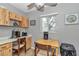 Bright dining area with a window and built-in wood cabinets at 8645 Sw 94Th Ln # A, Ocala, FL 34481