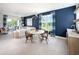 Stylish living room with a dining area and a large window with outdoor view at 0000 Se 47Th Loop, Ocala, FL 34480