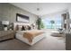 Spacious main bedroom features a large window with stunning views and a sitting area at 0000 Se 47Th Loop, Ocala, FL 34480