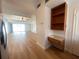 Efficient kitchenette featuring a built-in desk and shelves, perfect for a compact workspace at 11001 Se Sunset Harbor Rd # A08, Summerfield, FL 34491