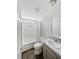 Bathroom with a step-in shower, wood-look flooring, and a tiled backsplash at 11745 Nw 15Th Lane, Ocala, FL 34482