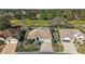 Aerial shot of a landscaped single-Gathering home on a golf course at 13424 Se 89Th Terrace Rd, Summerfield, FL 34491