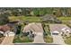Aerial shot of a landscaped single-Gathering home on a golf course at 13424 Se 89Th Terrace Rd, Summerfield, FL 34491