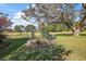 Well maintained lawn with a beautiful tree in the backyard at 13424 Se 89Th Terrace Rd, Summerfield, FL 34491