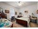 Bedroom with neutral carpet, wood furniture, and bright white walls at 13424 Se 89Th Terrace Rd, Summerfield, FL 34491