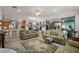 Open-concept living room with a view of the dining area at 13424 Se 89Th Terrace Rd, Summerfield, FL 34491