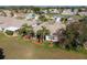 Sprawling single-story home with screened lanai, lush landscaping, and well-manicured lawn in a serene neighborhood at 13544 Se 89Th Terrace Rd, Summerfield, FL 34491