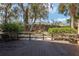 Private backyard featuring lush greenery, and a serene setting with a fence at 1621 Ne 2Nd St # 601, Ocala, FL 34470