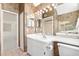 Bathroom with an extended vanity, a bright, modern design, and tiled floors at 1621 Ne 2Nd St # 601, Ocala, FL 34470