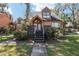 Attractive home with a welcoming front porch, steps, and charming landscaping at 1621 Ne 2Nd St # 601, Ocala, FL 34470