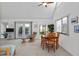 Bright living area with dining table and chairs, filled with natural light at 1621 Ne 2Nd St # 601, Ocala, FL 34470
