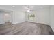 This home has vinyl plank flooring, neutral paint, and lots of windows at 22 Juniper Drive Crse, Ocala, FL 34480