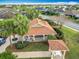 An aerial view of a neighborhood amenity center with a picnic area and adjacent parking at 383 Harlow Ln, The Villages, FL 32163