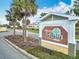 A community sign featuring the name 'Village of LaBelle North' in an inviting residential setting at 383 Harlow Ln, The Villages, FL 32163