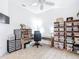 Office space with built-in shelving units and a ceiling fan at 383 Harlow Ln, The Villages, FL 32163