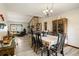 Spacious dining room with hardwood floors and views into the living room at 4420 Ne 1St St, Ocala, FL 34470