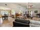 Large living room with a dining area and wood flooring at 4420 Ne 1St St, Ocala, FL 34470