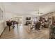 Comfortable living room featuring a piano, fireplace, and plush seating at 4420 Ne 1St St, Ocala, FL 34470