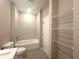 Bright bathroom features a tiled shower over tub and sleek fixtures at 4501 Sw 110Th Ln, Ocala, FL 34476