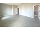 Spacious bedroom with wood-style tile flooring and ensuite bathroom at 4501 Sw 110Th Ln, Ocala, FL 34476