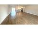 Open floor plan featuring kitchen and living space with tile flooring throughout at 4501 Sw 110Th Ln, Ocala, FL 34476