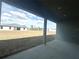 Covered patio overlooking the expansive backyard at 4501 Sw 110Th Ln, Ocala, FL 34476