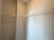 Walk-in closet featuring white wire shelving and neutral walls at 4501 Sw 110Th Ln, Ocala, FL 34476