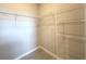 Walk-in closet with installed shelving for optimal storage at 4501 Sw 110Th Ln, Ocala, FL 34476