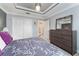 Bedroom featuring large windows, a closet and access to the bathroom at 503 Verlander St, The Villages, FL 34762