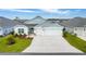 Charming single-Gathering home with a well-manicured lawn and a three-car garage at 503 Verlander St, The Villages, FL 34762