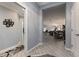 Hallway leading to open-concept living area, showcasing the home's spacious and flowing design at 503 Verlander St, The Villages, FL 34762
