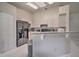 Efficient kitchen featuring black appliances, lots of lighting, and ample counter space at 5902 Sw 112Th Place Rd, Ocala, FL 34476