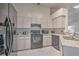 Well-equipped kitchen features sleek black appliances, granite countertops, and ample cabinet space at 5902 Sw 112Th Place Rd, Ocala, FL 34476