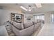 Spacious living room boasts skylights and stylish seating perfect for relaxing at 5902 Sw 112Th Place Rd, Ocala, FL 34476