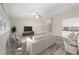 Bright living room with ample natural light, vaulted ceilings, and an open layout for comfortable living and entertaining at 5910 Sw 111Th Place Rd, Ocala, FL 34476