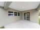 Covered outdoor patio offering a spot to entertain and enjoy the outdoors at 5910 Sw 111Th Place Rd, Ocala, FL 34476