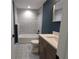Cozy bathroom with tub and shower combo, vanity with sink, and modern fixtures at 6276 Nw 65 Nw Pl, Ocala, FL 34482