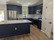 Beautiful kitchen with a center island, modern appliances, and sleek countertops at 6276 Nw 65 Nw Pl, Ocala, FL 34482