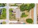Overhead view of home featuring well-maintained landscaping, mature trees, and surrounding streets at 6279 Se 8Th Lane, Ocala, FL 34472