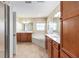 Large primary bathroom featuring double vanities, soaking tub, and natural lighting at 6279 Se 8Th Lane, Ocala, FL 34472